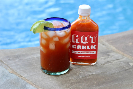 Bloody Mary with Hot Garlic in front of pool